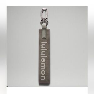 Lululemon Never Lost Keychain Grey Sage/White Opal Silver Hardware